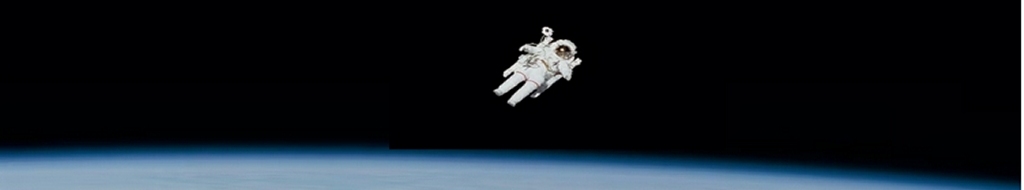 NASA photo of astronaut in EVA against earth limb